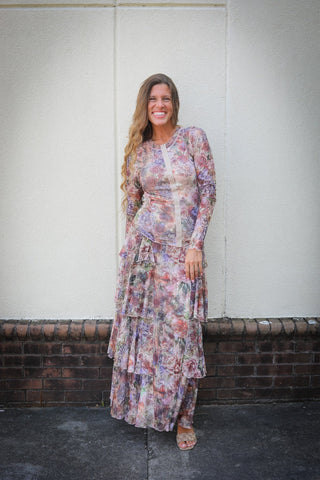 Model wearing the Rosalie floral top and skirt set